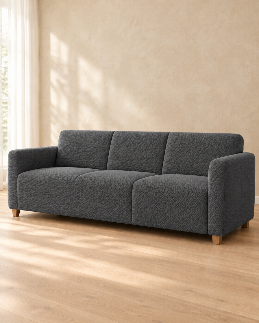 Housse de canapé jacquard coloris anthracite sur canapé 3 places